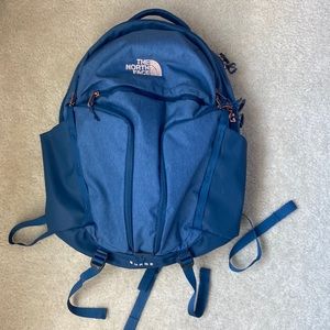 blue north face backpack surge